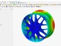 Symulacja naprężeń felgi w programie do projektowania CAD. Kolory wskazują rozkład naprężeń.