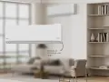 Un elegante aire acondicionado Fujitsu AIRSTAGE modelo ASY35UI-KN con WiFi, instalado en una sala de estar moderna.