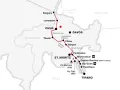 Mapa tras **kolei retyckich** z zaznaczonymi miastami: Chur, Davos, St. Moritz, Tirano. Widoczne Albulatunnel i przełęcz Bernina.