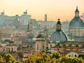 A breathtaking panorama of Rome's domes and rooftops at sunset, capturing the essence of Rome in one day.