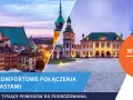 Szybkie połączenie pociągiem z Warszawy do Kielc. Widok na zabytkowe budynki obu miast.
