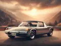 Srebrny Porsche 914 na tle górskiego krajobrazu o zachodzie słońca.