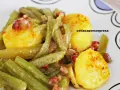 Delicioso plato de borrajas con patatas y trocitos de bacon. Un clásico casero que nunca falla.
