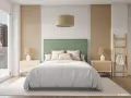 Acogedor dormitorio verde y madera con cabecero tapizado, mesitas de noche de madera y lámparas.