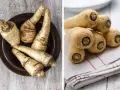 Frische Pastinaken und Petersilienwurzeln liegen auf einem rustikalen Holztisch.