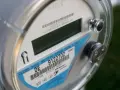 Licznik energii elektrycznej, model CL200, z etykietą wskazującą na taryfę G12 Tauron.