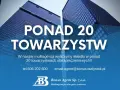 Dwa nowoczesne wieżowce z niebieskimi fasadami, tekst "PONAD 20 TOWARZYSTW".