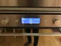 Ugnens display visar 170°C och "Varmluft". Trots inställningen verkar ugnen inte bli varm.
