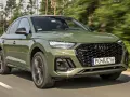 Zielony Audi Q5 Sportback w ruchu. Sprawdź aktualną audi q5 cena i dostępne wersje.