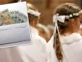 Koperta z pieniędzmi i dziewczynki w białych strojach komunijnych.