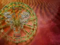 Znak zodiaku Byk (Taurus) w kole zodiakalnym, ozdobiony stylizowanym wizerunkiem głowy byka.