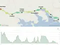Mapa del **camino portugués desde Baiona** a Santiago, con perfil de altitud. Muestra la ruta costera pasando por Vigo y Pontevedra.