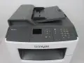 Drukarka Lexmark MX310dn z panelem sterowania i podajnikiem dokumentów.