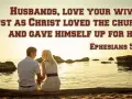 A couple sits by the sea, embodying the biblical definition of love as husbands love their wives as Christ loved the church. Ephesians 5:25.