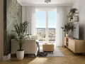 Przytulny, bardzo mały salon w bloku z designerską tapetą, jasną kanapą i widokiem na miasto.