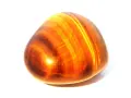 Piedra ojo de tigre pulida, con bandas doradas y marrones. Ideal para aprender como limpiar ojo de tigre y mantener su brillo.