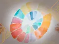 Rouge, orange, jaune, bleu... Un cercle de couleurs vives, comme un arc-en-ciel, invite à faire du mélange.