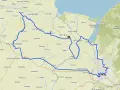 Mapa z zaznaczonymi trasami rowerowymi wokół Elbląga, prowadzącymi przez malownicze tereny Żuław i Rezerwatu Przyrody Zatoka Elbląska.