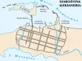 Mapa starożytnej Aleksandrii pokazuje, gdzie leży miasto: nad Morzem Śródziemnym, z portem, latarnią morską, Heptastadionem i dzielnicą żydowską.