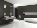 Élégante salle de bain blanc et noir avec baignoire îlot, double vasque et porte-serviettes.