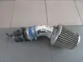 Tuningowy filtr stożkowy do Audi A3 1.8 TFSI BZB. Zapewnia lepszy przepływ powietrza, co daje większą moc i dźwięk.
