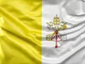 Flaga papieska: złote i białe pasy, z kluczami św. Piotra i tiarą papieską.