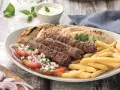 Jak się pisze kebab? Odkryj poprawną pisownię i użycie w polskim