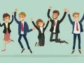 Cinq personnes en tenue d'affaires sautent de joie, symbolisant un excellent team building en entreprise.