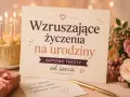 Wzruszające życzenia urodzinowe dla starszej osoby: tort, kwiaty i prezent. Gotowe teksty od serca.