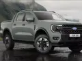 Nowy Ford Ranger Platinum w kolorze zielonym, gotowy na przygodę w górach.