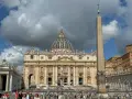 St. Peter's Basilica, one of the most beautiful churches in Rome, stands majestically with its dome and an ancient obelisk in the foreground.
