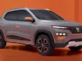 Szary samochód Dacia Spring z pomarańczowymi akcentami na tle pomarańczowym.
