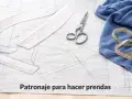 Herramientas de costura sobre un patrón de ropa. Tijeras, reglas y cinta métrica listos para crear un nuevo diseño.