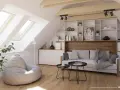 Accogliente salotto in mansarda con divano, pouf, libreria e lucernari che inondano lo spazio di luce.