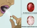 Anello con pietra colore rubino, soffiata si schiarisce subito. Altra pietra rimane appannata.
