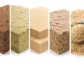 Blocchi di sughero, lana di roccia, fibra di legno e canapa: esempi di materiali isolanti naturali per un futuro sostenibile.