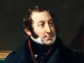 Portret Gioacchino Rossiniego, kompozytora znanego z oper. Jego bogate kompozycje, jak "Cyrulik sewilski", wciąż zachwycają.