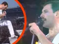 Freddie Mercury w białym stroju, z mikrofonem w dłoni, na tle tłumu. To mógł być jego ostatni koncert.