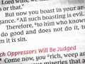 Close-up of a Bible page, showing text about the sin of omission: "to him who knows to do good and does not do it, to him it is sin.