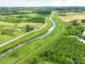 Malownicze trasy rowerowe Częstochowa wzdłuż kanału, otoczone zielenią i polami. Idealne miejsce na aktywny wypoczynek.