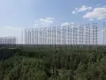 Gigantyczne anteny radarowe Duga, pozostałość po zimnej wojnie, górują nad lasem. Niezwykłe miejsce na wycieczkę do Czarnobyla.