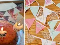 Geburtstagstorte mit Kerzen und einer selbstgemachten Wimpelkette. Daneben liegen weitere bunte Wimpelketten zum Basteln.