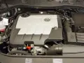 Silnik 2.0 TDI 140KM Volkswagena z widocznym logo TDI i emblematem marki.