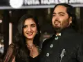 Anant Ambani, con la sua futura sposa Radhika Merchant, in abiti eleganti.