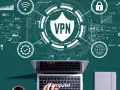 Grafika przedstawia laptopa z widokiem na klawiaturę, na tle schematów sieciowych i symboli VPN. To jak cyfrowy świat, gdzie hamachi zapewnia bezpieczne połączenie.
