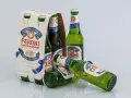 Butelki piwa Peroni Nastro Azzurro. Zastanawiasz się, czy można mieć alkohol w bagażu rejestrowanym?