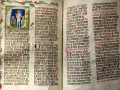 First Sunday of Advent readings from an illuminated manuscript. Jesus is depicted in the initial letter, with ornate borders and calligraphy.