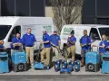 Sage Restoration team with equipment to help you get smoke smell out of house.