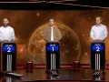Trzech mężczyzn, Łukasz i dwaj Piotrowie, stoi przy swoich podium. Jeden z dziesięciu, kiedy finał.