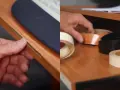 Manos reparando melamina despegada con cinta adhesiva de borde.